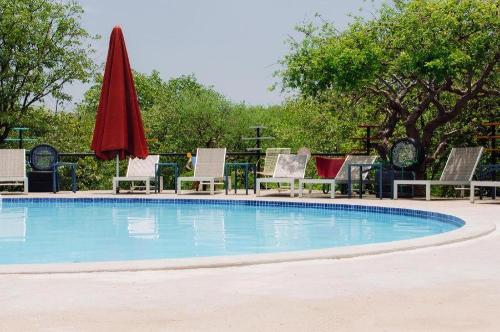 Etosha Safari Camp, Etosha National Park, Namibia Hotel Okaukuejo Exterior photo
